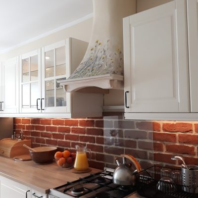Traditional cooker hood with wooden, frame, cutting, profiling wood.